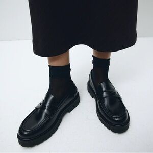 Women’s black chunky faux leather platform loafers